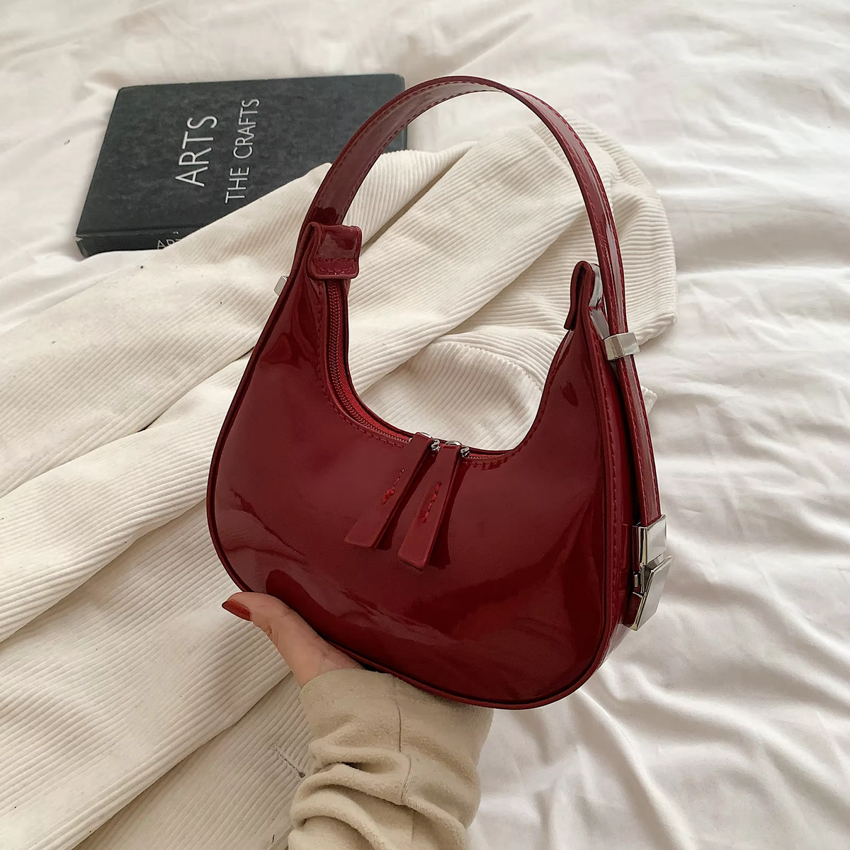 Zelda Glossy Half-Moon Bag