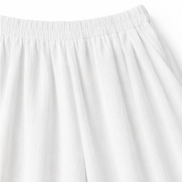 Elovena – Asymmetric Hem Top & Wide-Leg Pants Set